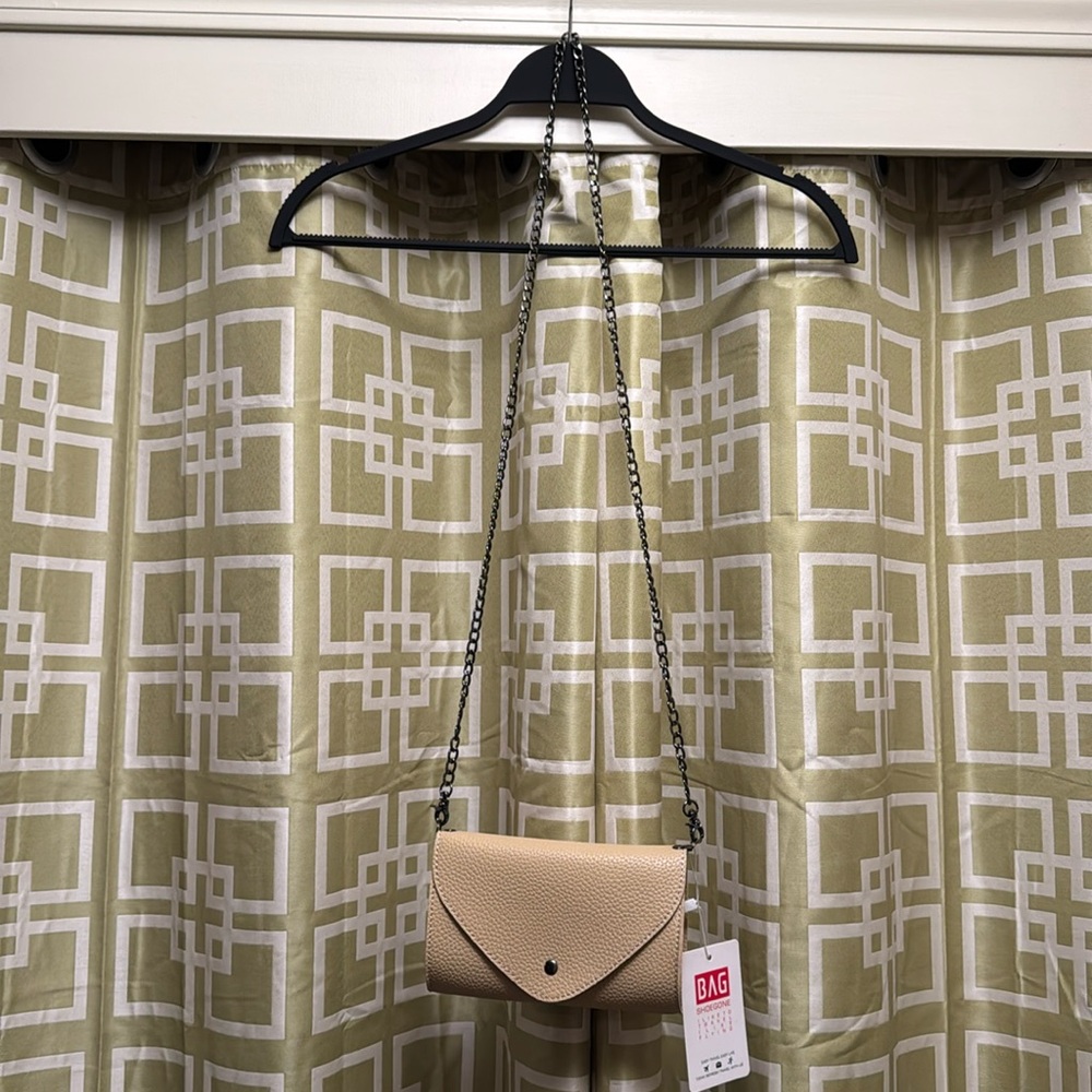 Vegan leather beige crossbody/belt bag.       7” x 4.5”